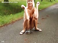 Stunning blonde adores peeing in the park