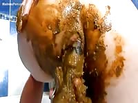 Glorious and extremely messy masturbation video featuring a teen using a scat covered dildo