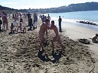 Naked public fight near the sea