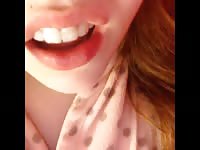 Closeup movie of eighteen year old girl sliding her little finger in-and-out of her moist pussy