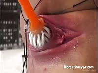 Insane pussy destruction as this cock hungry whore pounds her hole with a toilet bowl brush