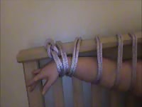 Helpless blindfolded plumper in BDSM restraints getting her cunt licked by an animal